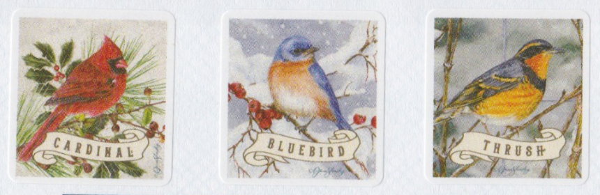 Three Boys Town cinderella stamps picturing a cardinal, a bluebird, and a thrush
