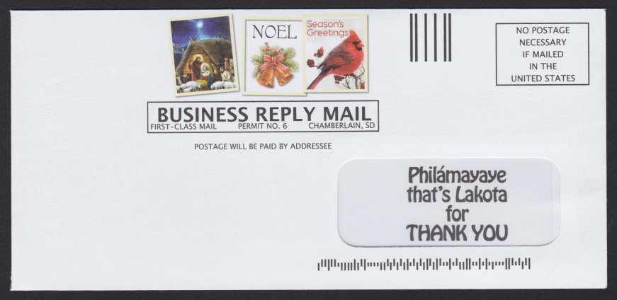 Business reply envelope with pre-printed stamp-sized images from St. Joseph’s Indian School