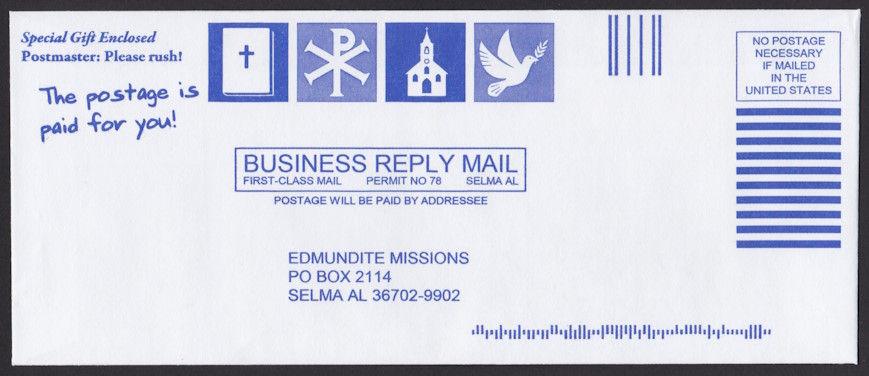 Edmundite Missions business reply envelope with four preprinted stamp-sized designs picturing a Bible, a Chi Rho, a church, and a dove